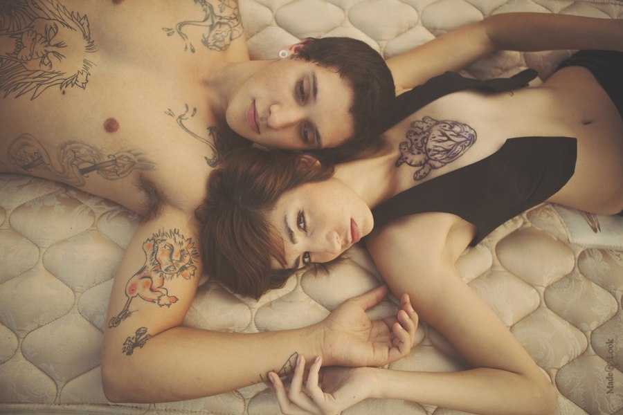 Tattooed couple orgasm